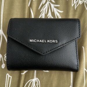 Black Michael Kors tri-fold wallet